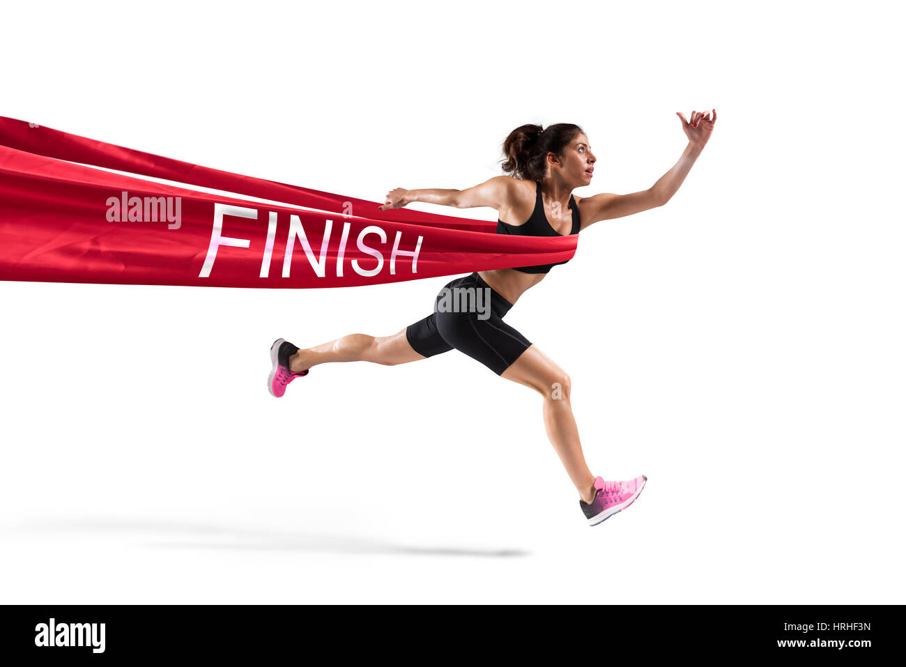 Vincitore runner donna sulla linea del traguardo Foto Stock