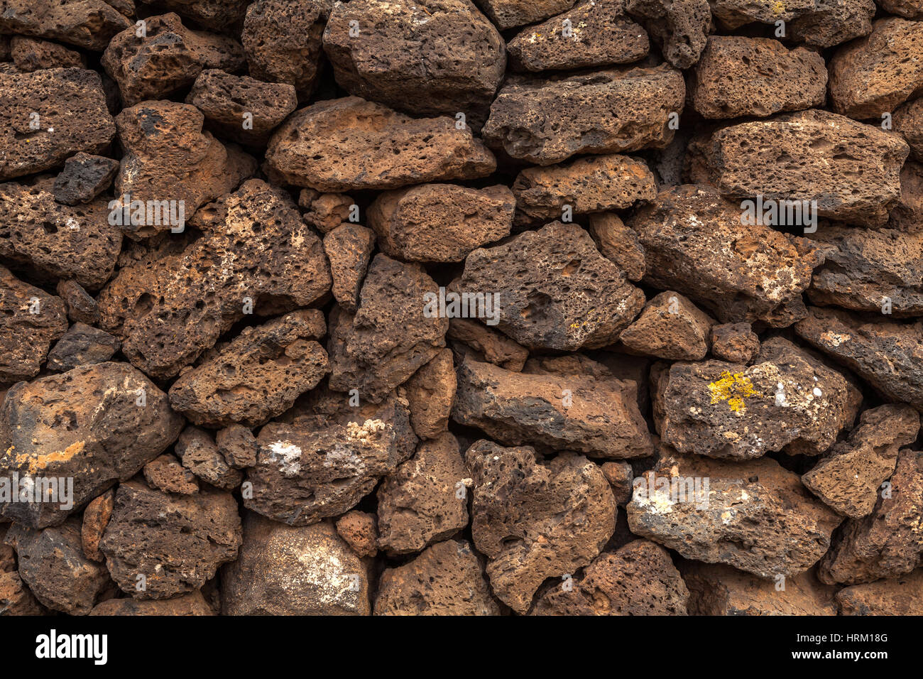 Immagine di lava vulcanica muro di pietre. Lanzarote, Isole Canarie, Spagna. Foto Stock