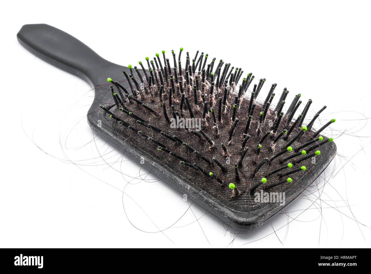 Primo piano a sporca Spazzola per capelli su sfondo bianco/ isolato Foto Stock