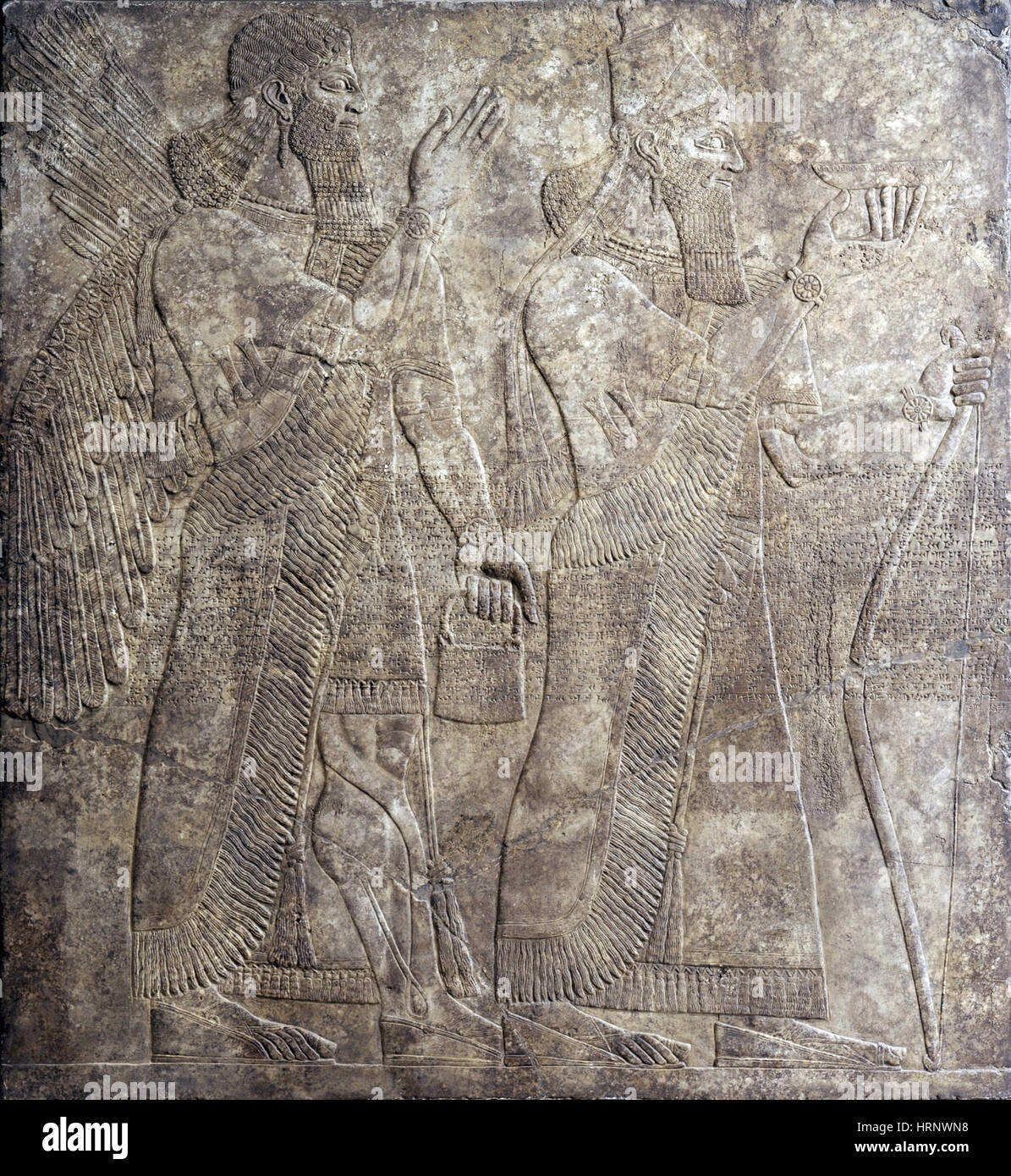 Ashurnasirpal II e divinità, IX secolo A.C. Foto Stock