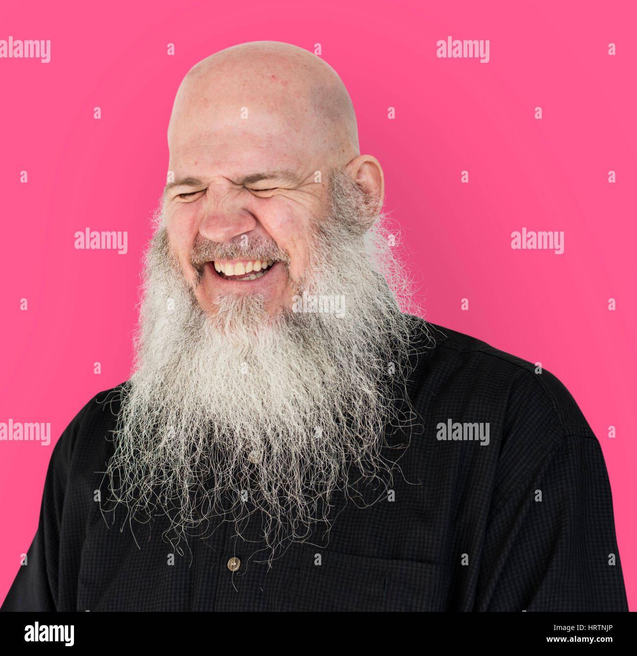 Gli uomini adulti barba lunga testa calva sorriso Foto Stock