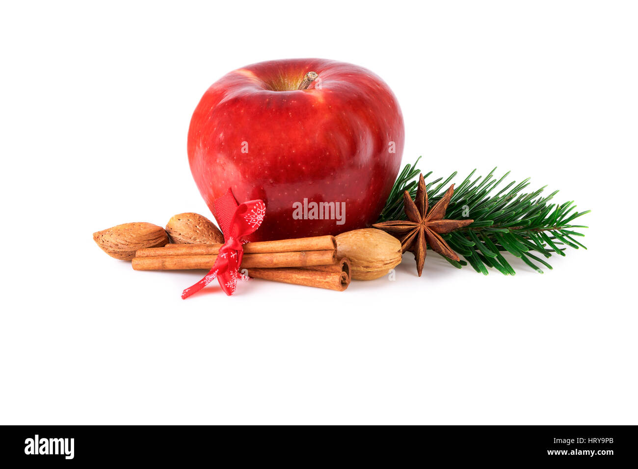 Natale rosso apple con spezie ingredienti su bianco Foto Stock