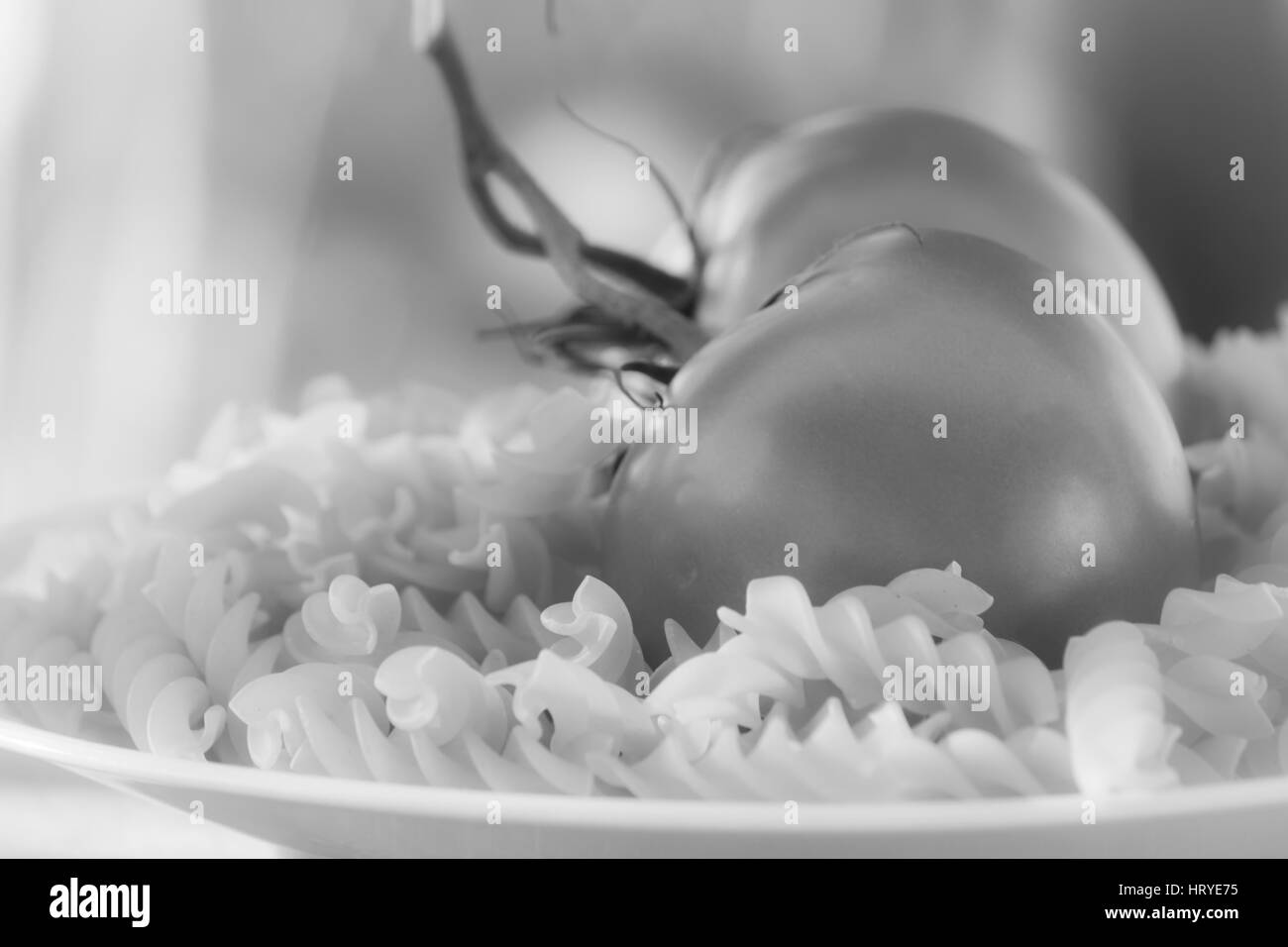 Italian fusilli con pomodori Foto Stock