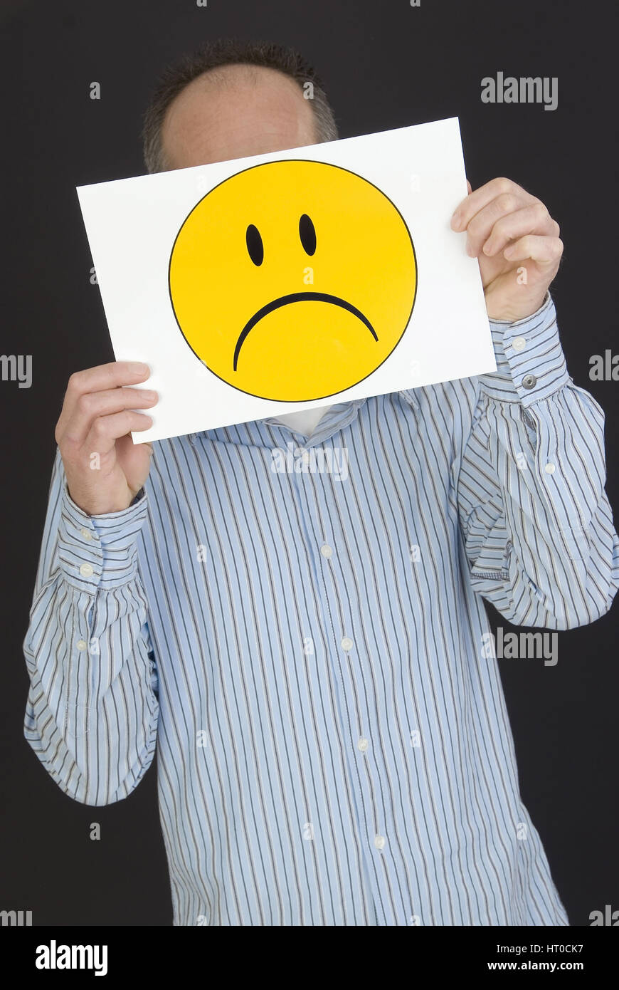 Mann mit traurigem Smileygesicht - uomo con triste faccina Foto Stock