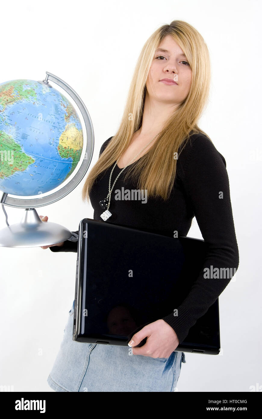 Sch'lerin mit Globus und Laptop - School girl con globo e il computer portatile Foto Stock