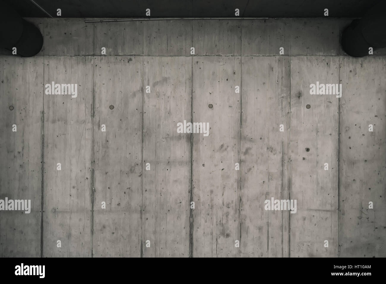 Parete in cemento come sfondo cupo, moderna superficie per urbano esterno Foto Stock