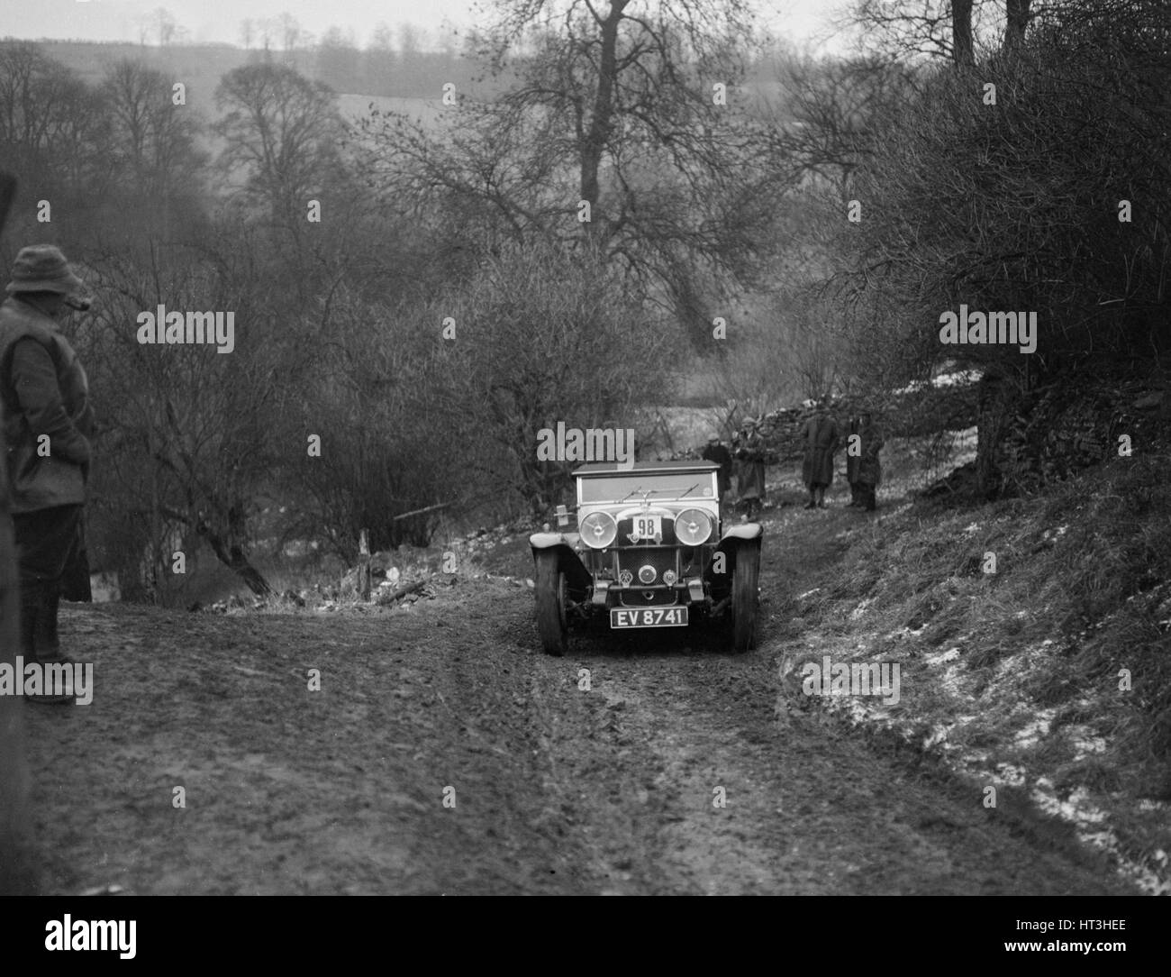 Alvis Silver Eagle di EW Bass competere nel Sunbac Colmore Trial, Gloucestershire, 1933. Artista: Bill Brunell. Foto Stock