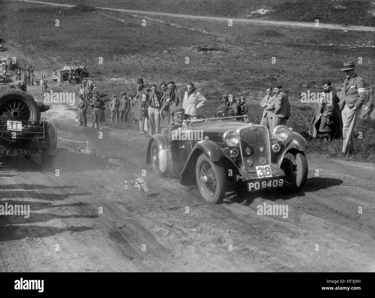 1933 cantante in competizione in una prova motoristica, Bagshot Heath, Surrey, 1930s. Artista: Bill Brunell. Foto Stock