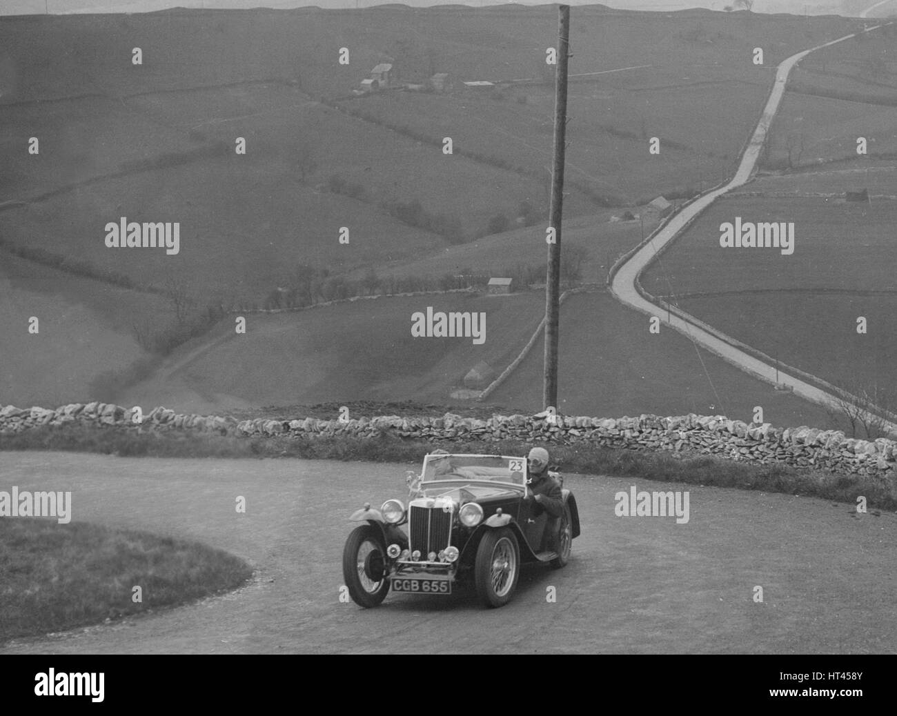 MG TA del WC Reid competere nel Rally RAC, 1939. Artista: Bill Brunell. Foto Stock