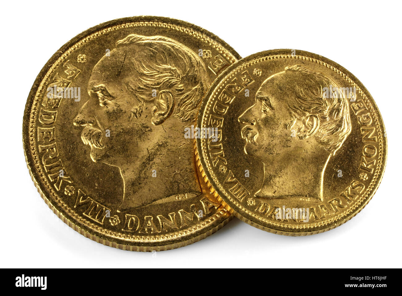 Danese delle monete in oro isolati su sfondo bianco Foto Stock