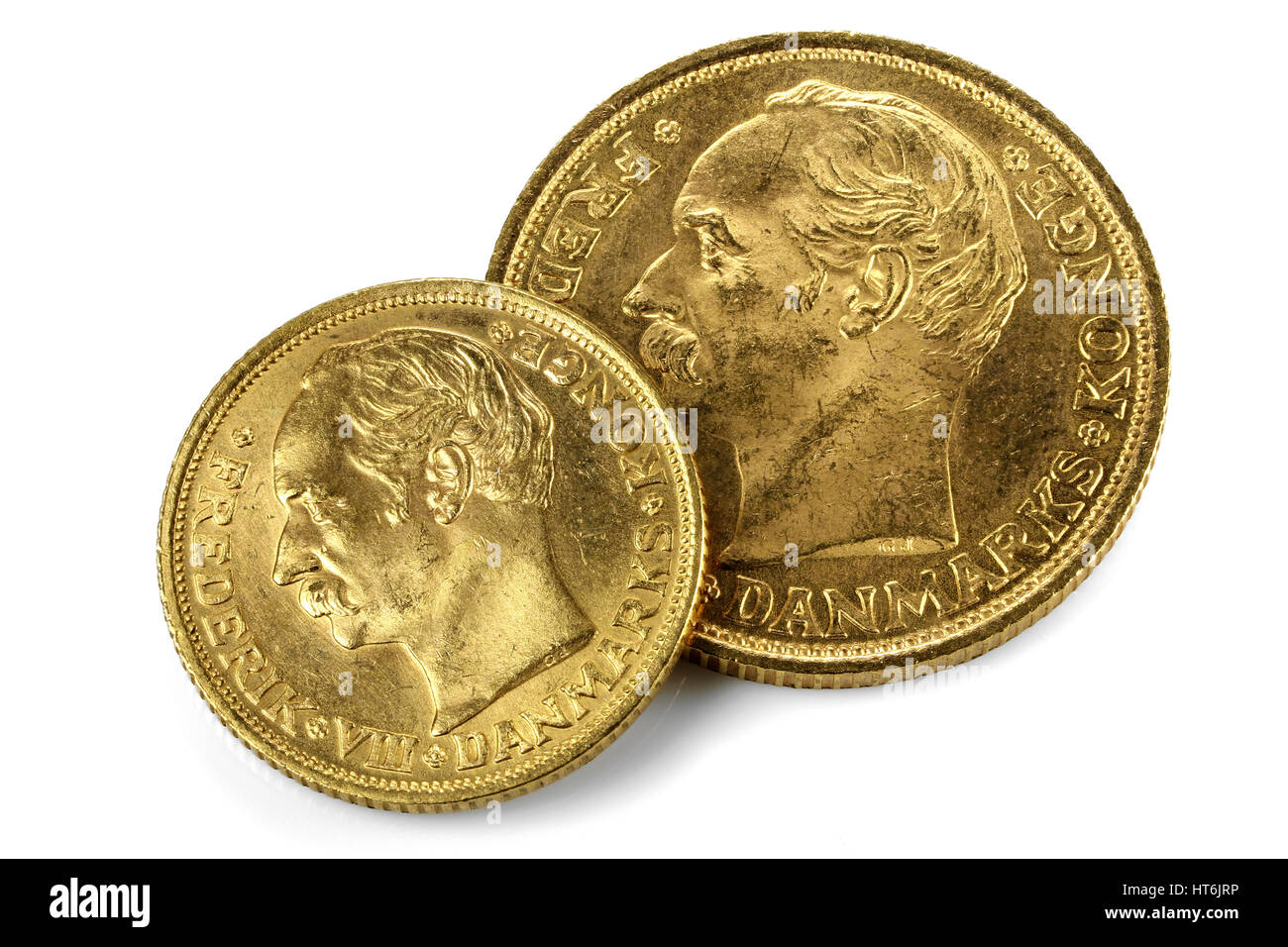 Danese delle monete in oro isolati su sfondo bianco Foto Stock