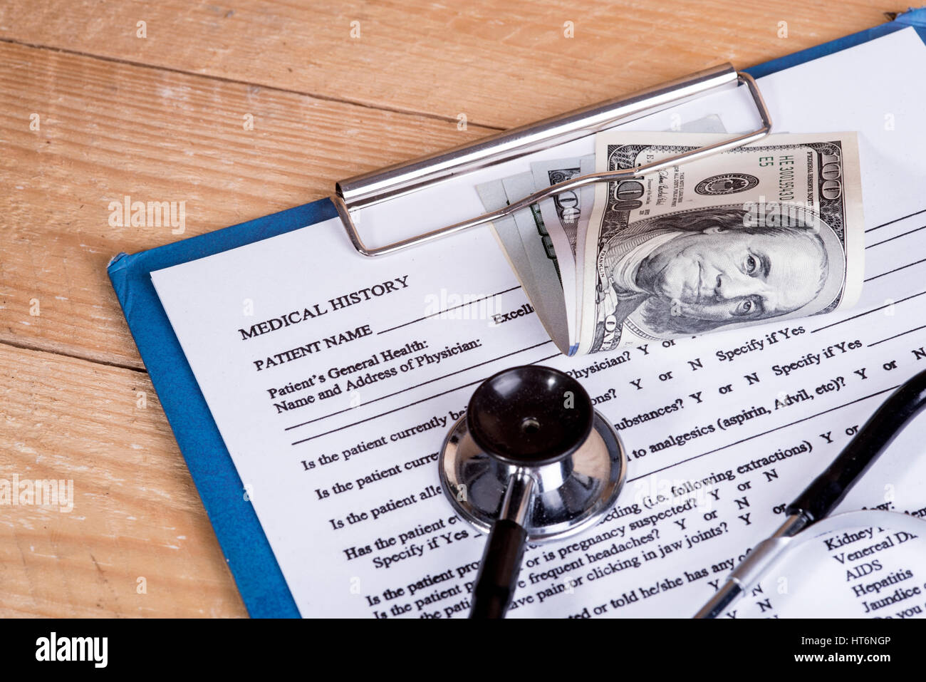 La storia medica questionario e denaro Foto Stock