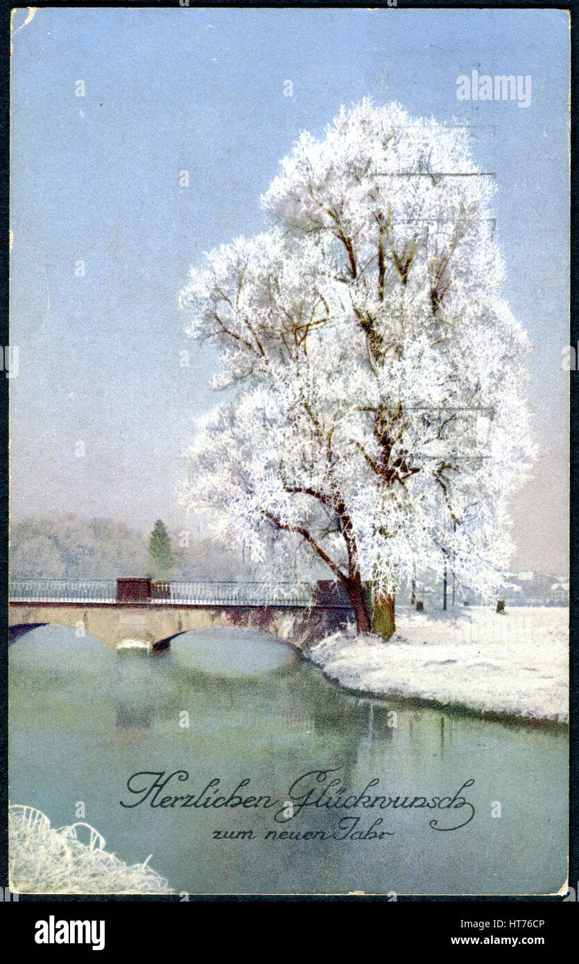 Una cartolina di Natale stampato in Svizzera mostra un paesaggio invernale. Iscrizione in tedesco: la felicità nel nuovo anno Foto Stock
