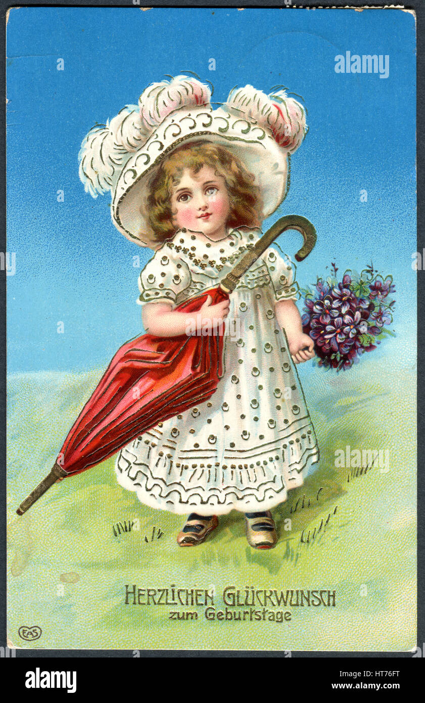 Una cartolina di auguri stampato in Germania, mostra una bambina con un  cappello e un ombrello. Iscrizione in tedesco: Buon compleanno Foto stock -  Alamy