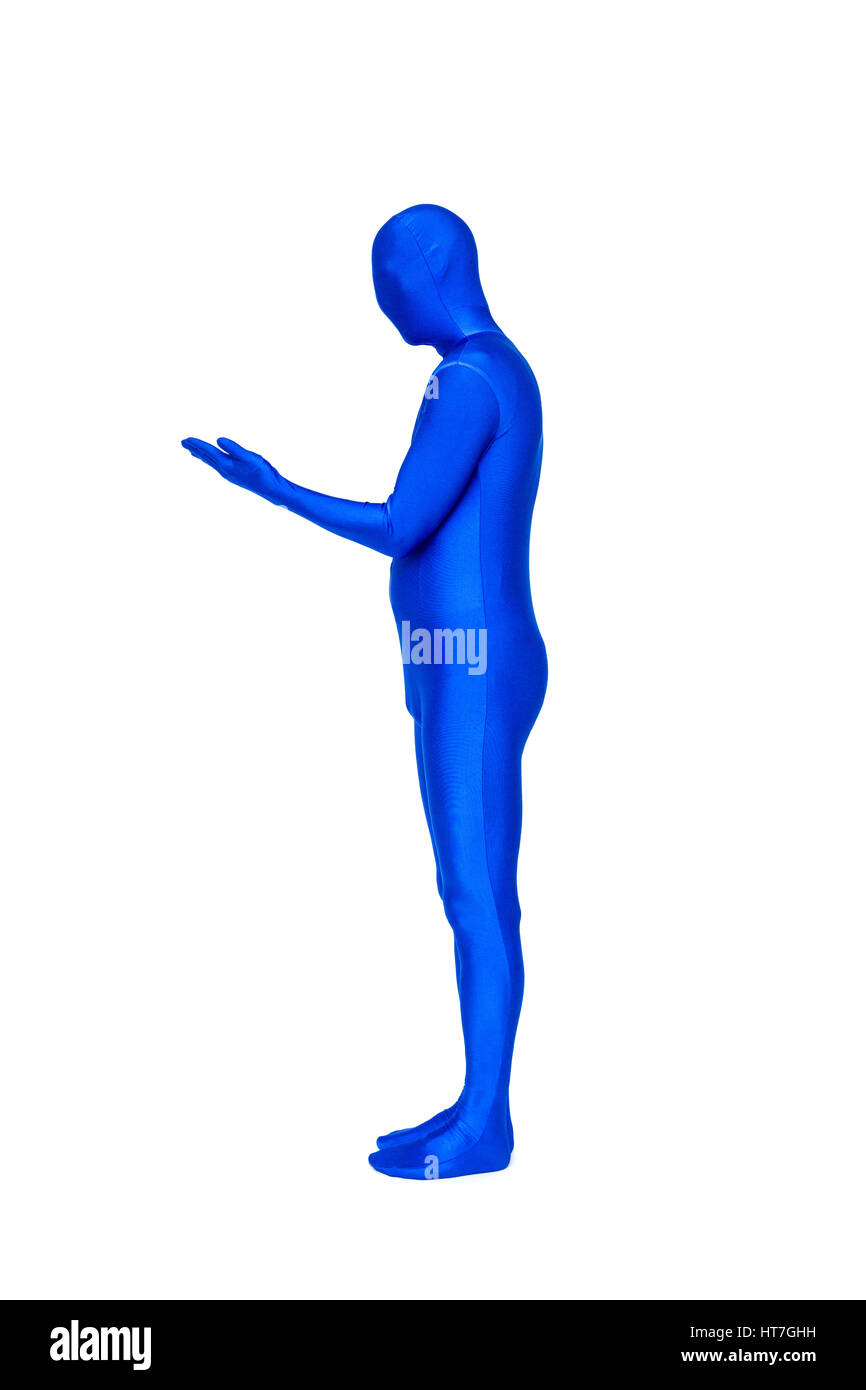 Misterioso uomo blu in costume vista laterale Foto Stock