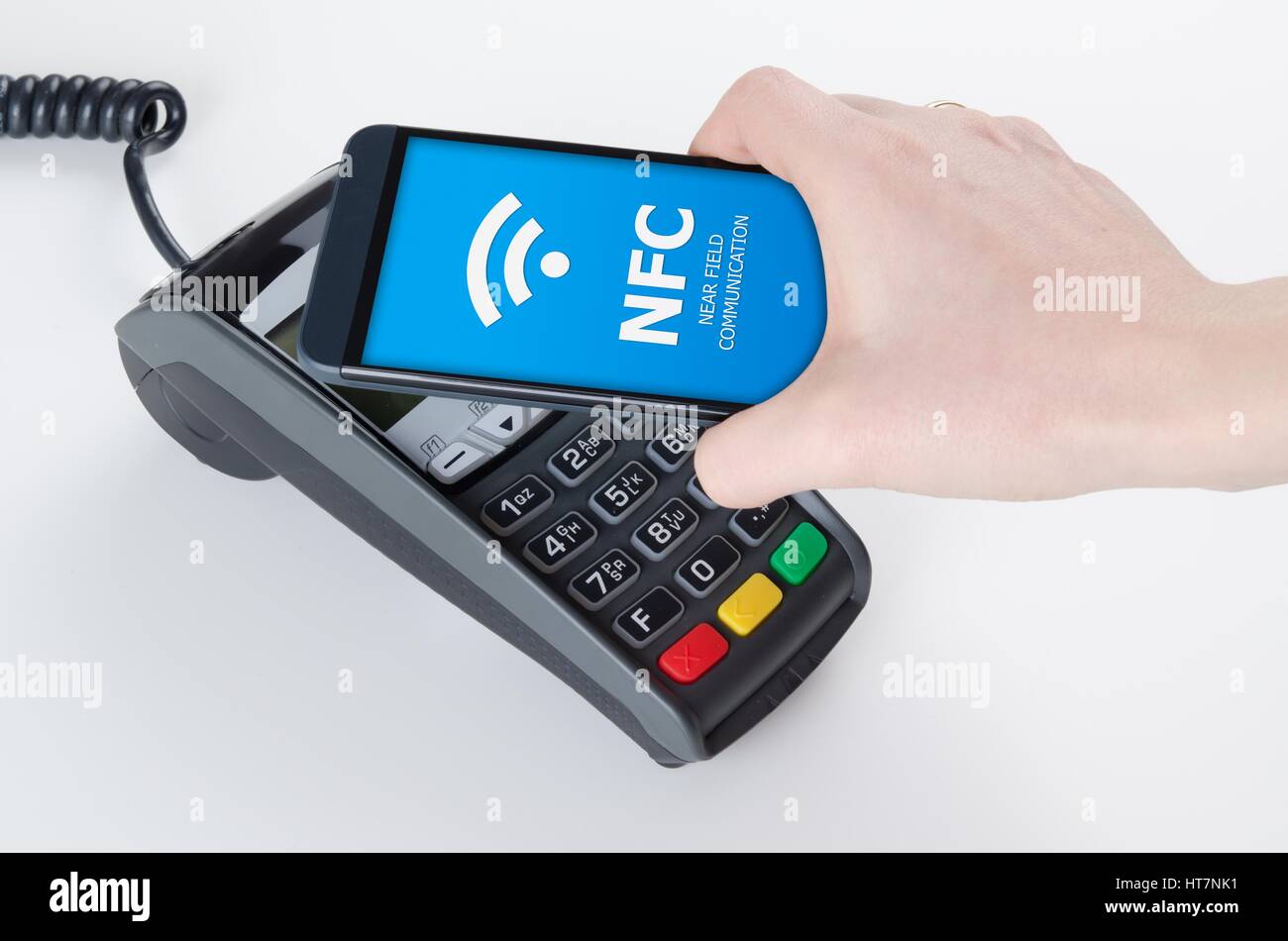 Pagamento mobile con tecnologia NFC near field communication technology Foto Stock