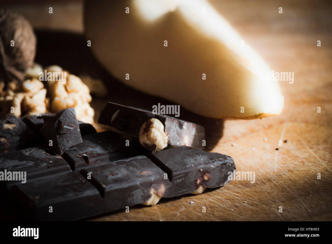 Pere, cioccolato e dadi Foto Stock