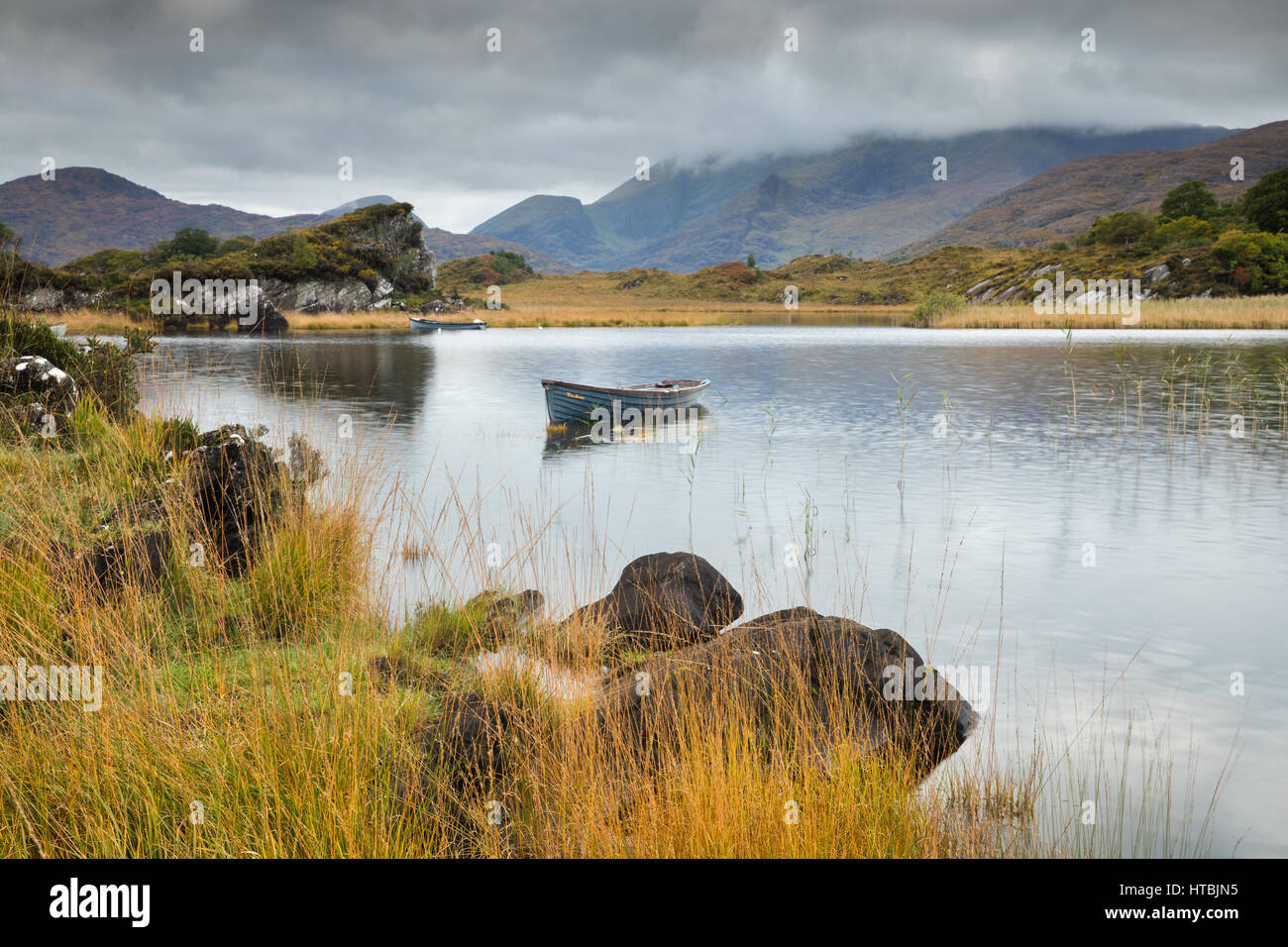 Una barca sul Lago Superiore nr, Killarney, Co. Kerry, Irlanda Foto Stock