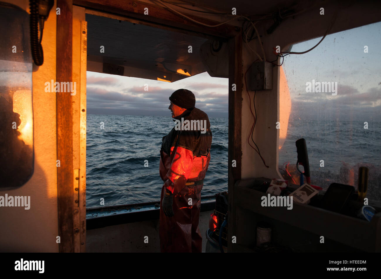 Lobsterman prende nella vista dopo una lunga 14 ore al giorno Foto Stock