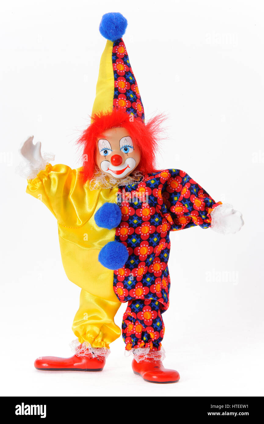 Funny clown con costumi variopinti isolate su sfondo bianco Foto Stock
