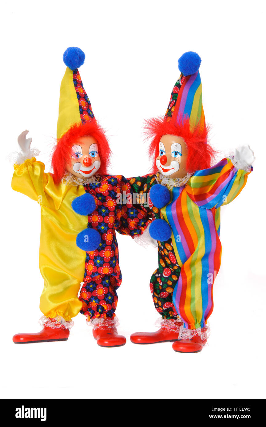 Funny clown con costumi variopinti isolate su sfondo bianco Foto Stock