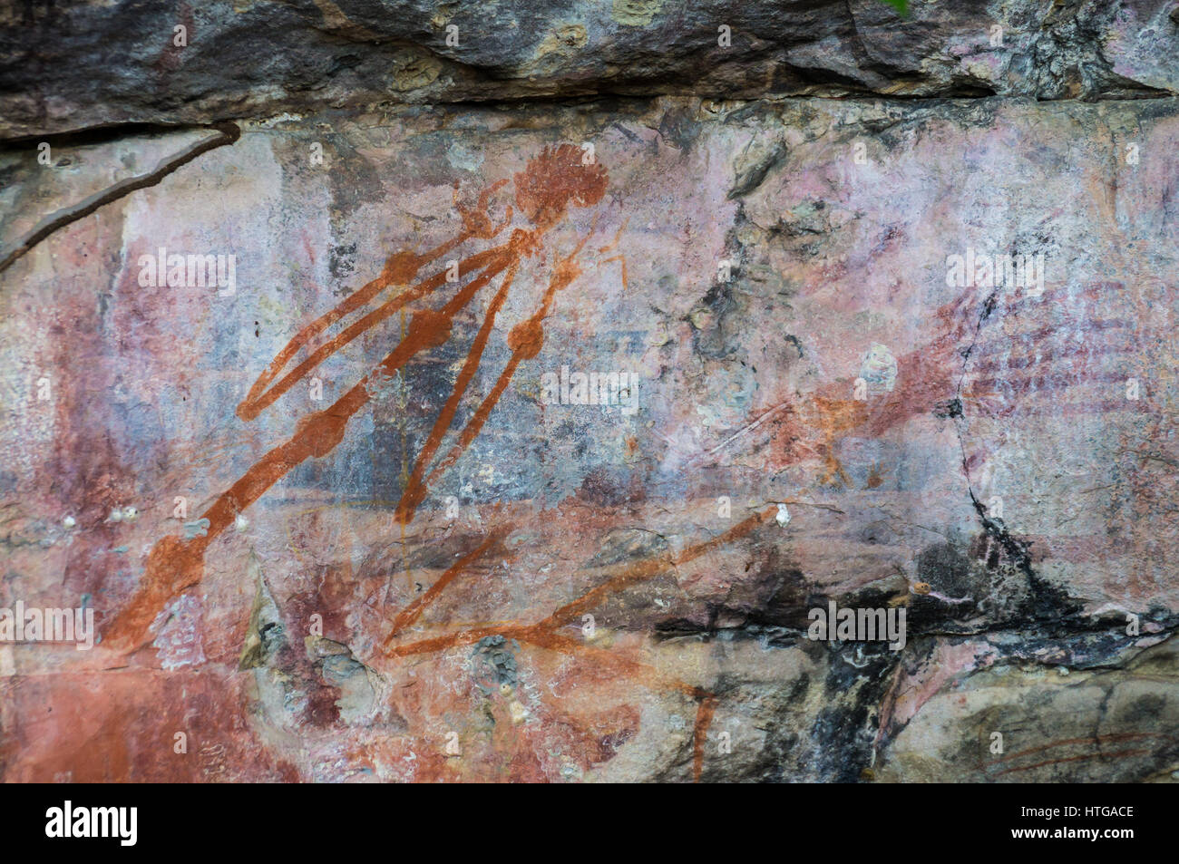 Dipinti aborigeni su roccia, il Parco Nazionale Kakadu, Territorio del Nord, l'Australia. Il dipinto è un avvertimento a non disturbare un luogo sacro e minacciano Foto Stock