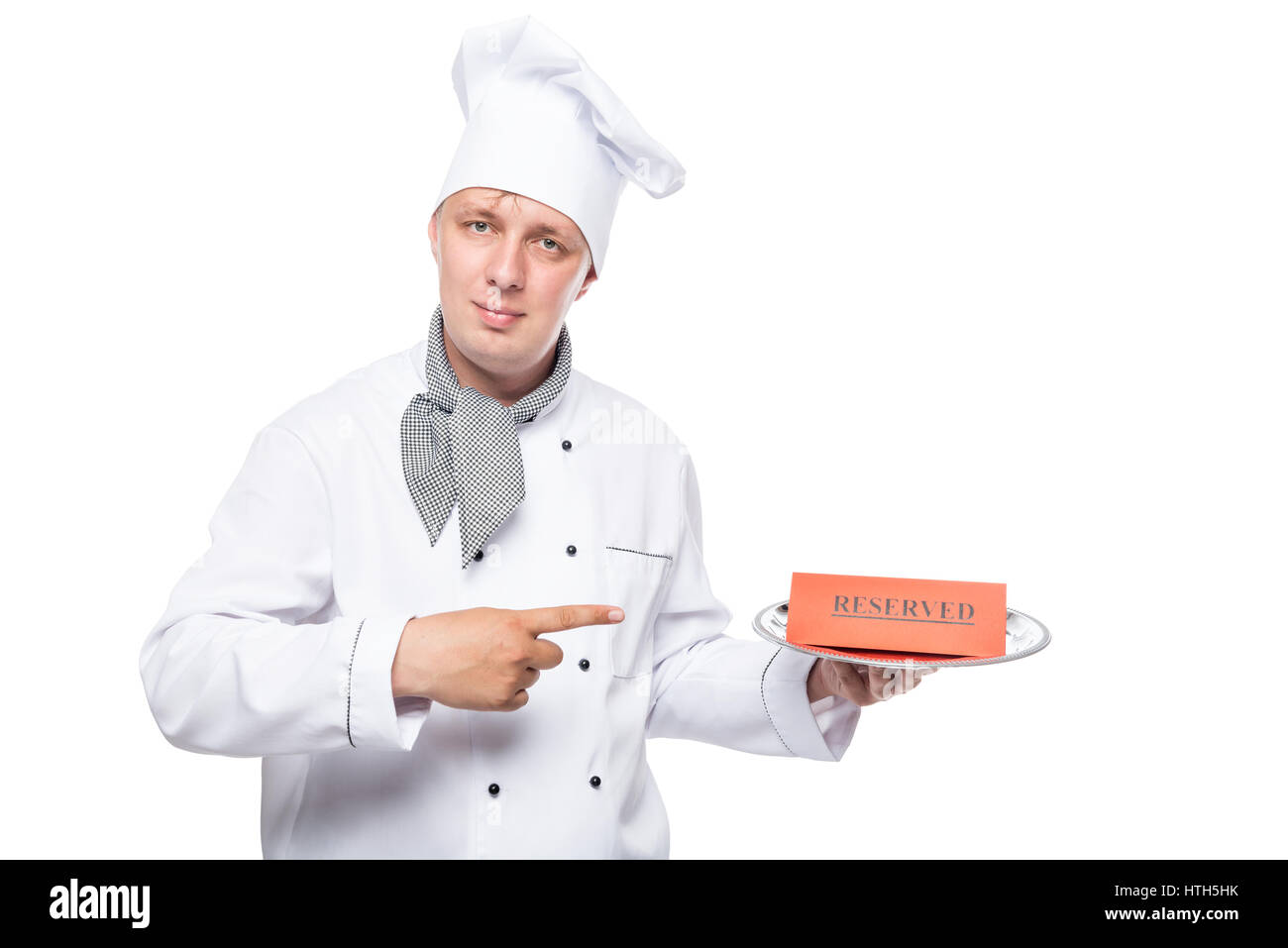 Ritratto di uno chef con una riserva su un vassoio isolati su sfondo bianco Foto Stock