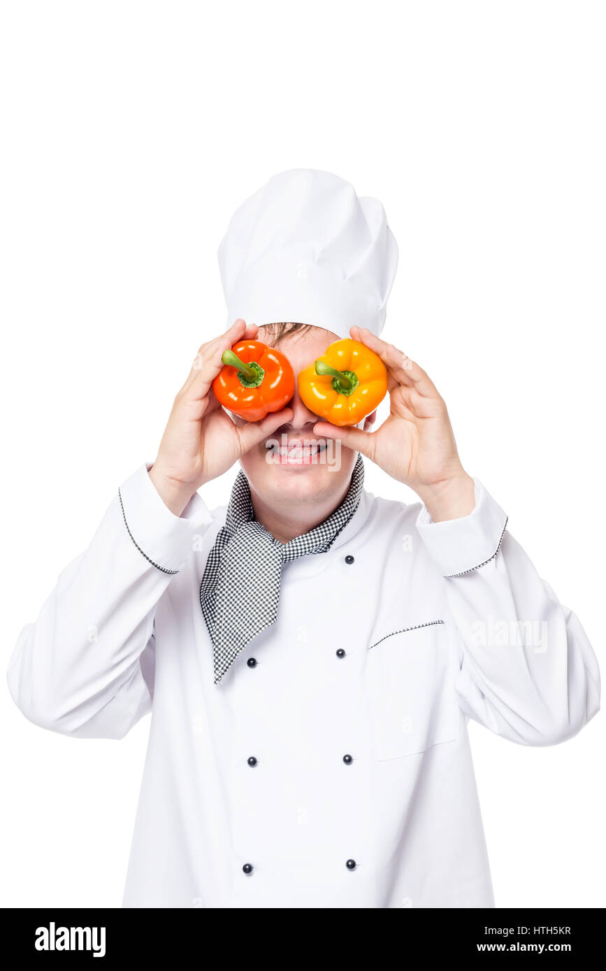 Ritratto verticale di un cook con il binocolo di pepe su sfondo bianco Foto Stock