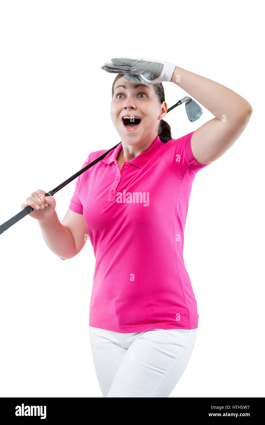Atleta donna guardare la pallina la traiettoria di volo di golf su uno sfondo bianco Foto Stock