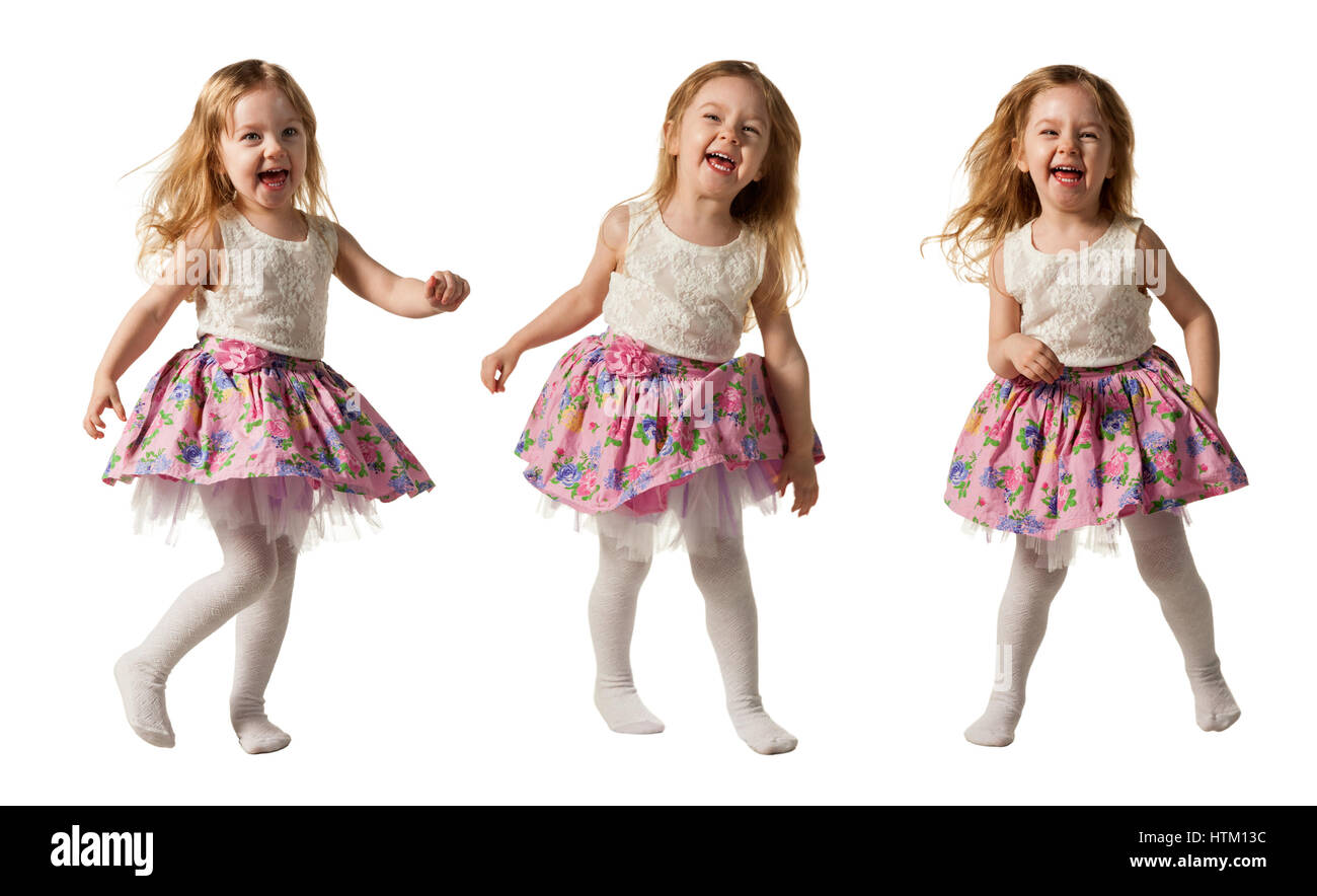Carino bambina in esecuzione con gioia isolati su sfondo bianco Foto Stock
