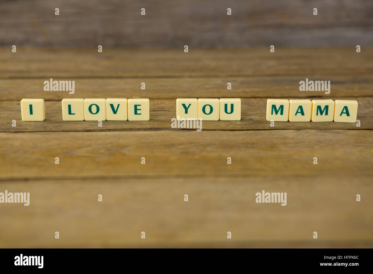 Close-up di ti amo mamma blocco su sfondo di legno Foto Stock