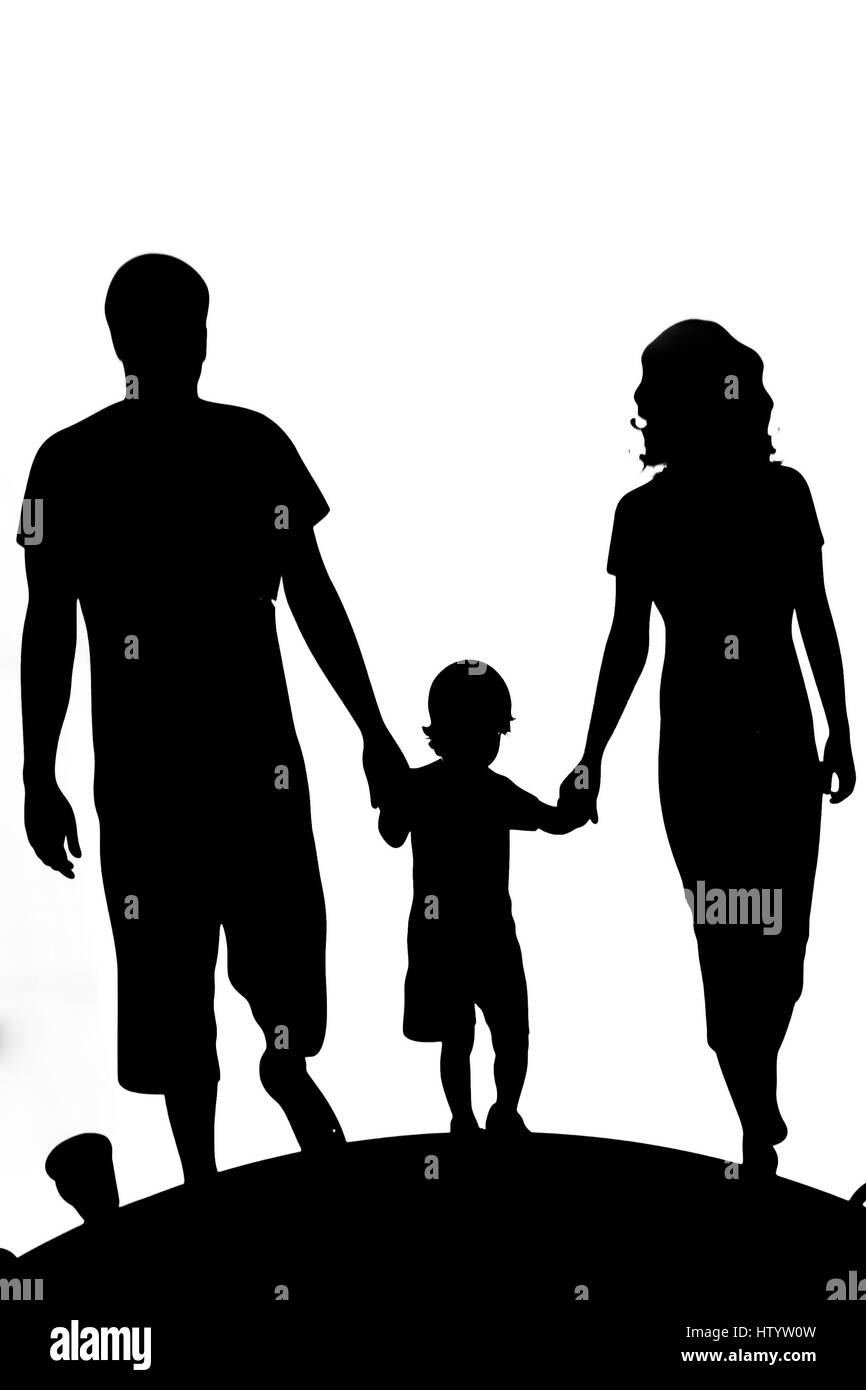 La famiglia felice. Padre, madre e figlio e figlia insieme. Foto Stock