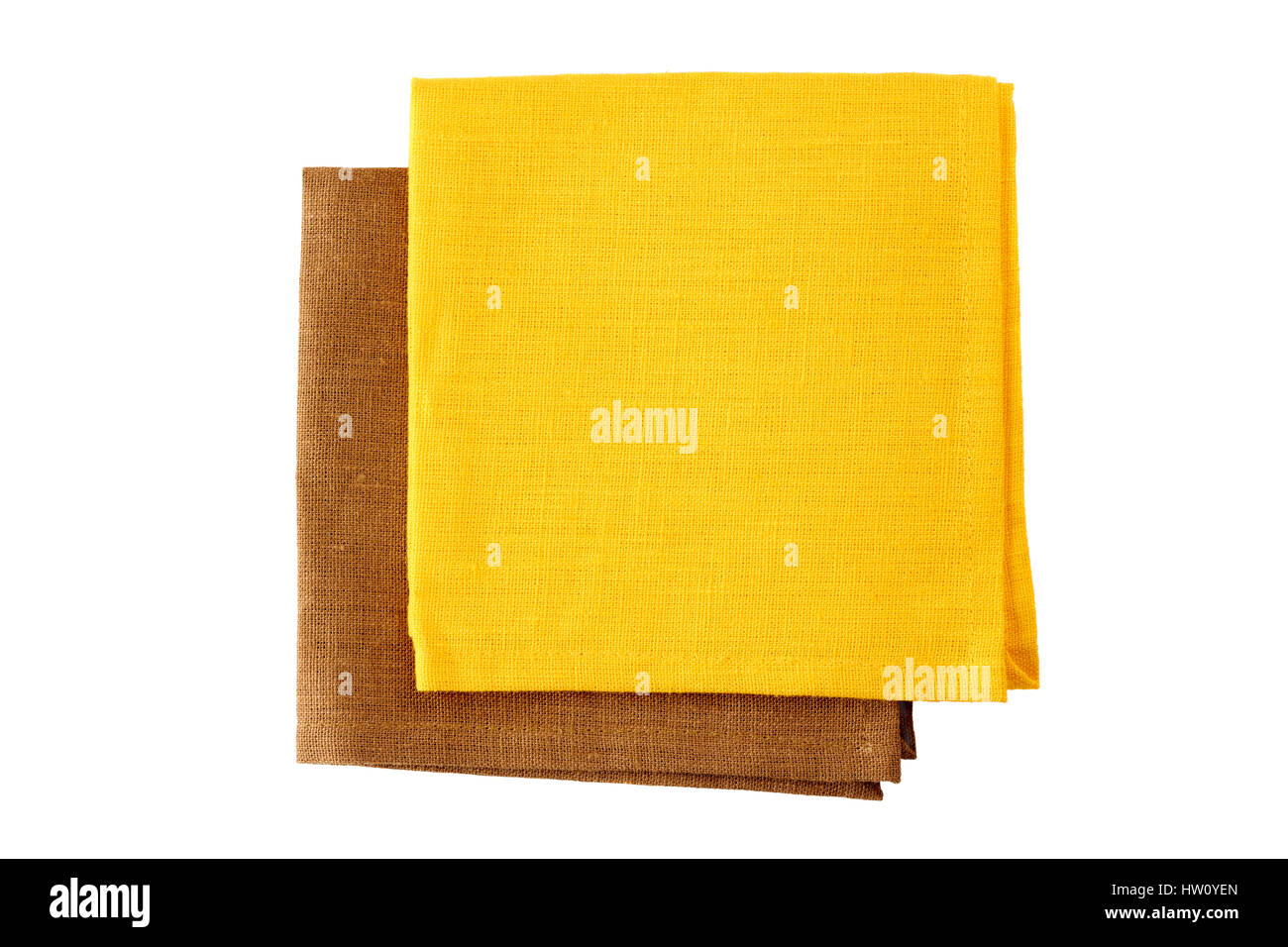 Due tovaglioli coloratissimi, giallo e marrone su bianco Foto Stock