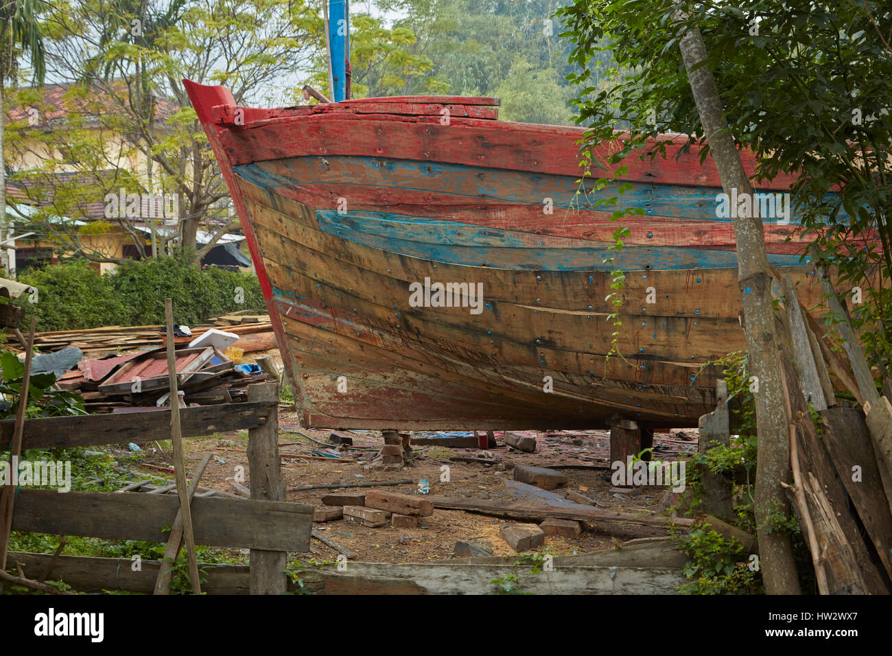 Imbarcazione in legno edificio, Cam Isola Kim, Hoi An, Vietnam Foto Stock