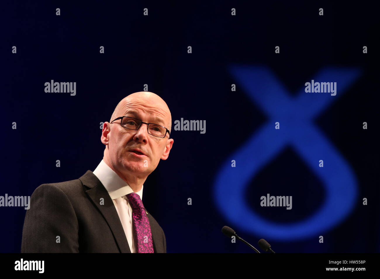 Il vice primo ministro John Swinney parla durante la SNP conferenza di primavera presso la AECC di Aberdeen. Foto Stock