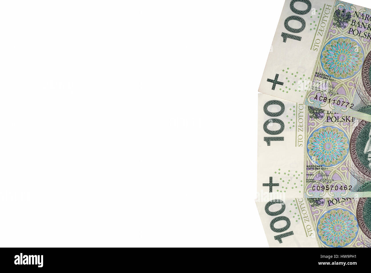 Zloty polacco cento banconote sul libro bianco sullo sfondo closeup con copia spazio. Foto Stock