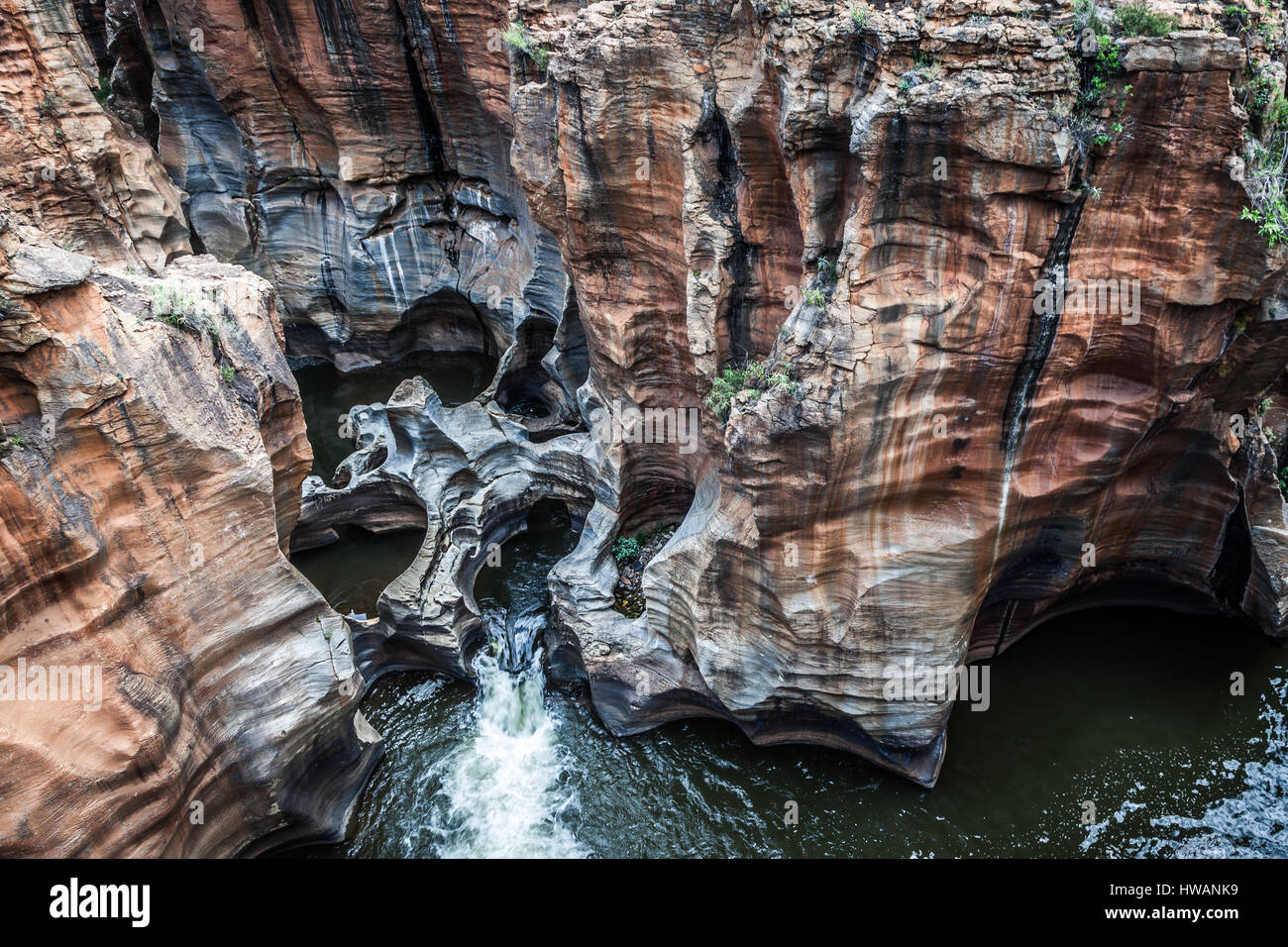 Bourke's Luck buche sul Panorama Route in Sud Africa sono uno splendido esempio di erosione di roccia - un paesaggio formato da migliaia di anni. Foto Stock