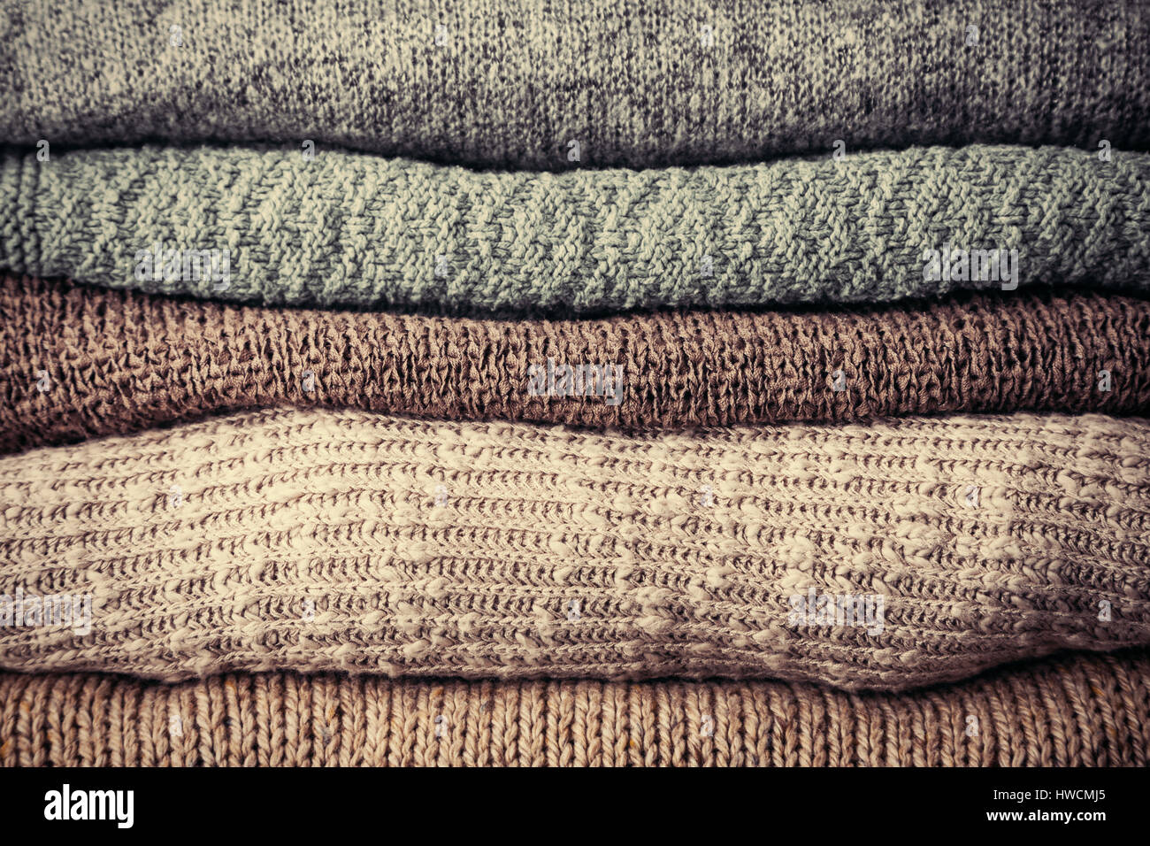 Pila di tessuti lavorati a maglia abbigliamento invernale closeup Foto  stock - Alamy