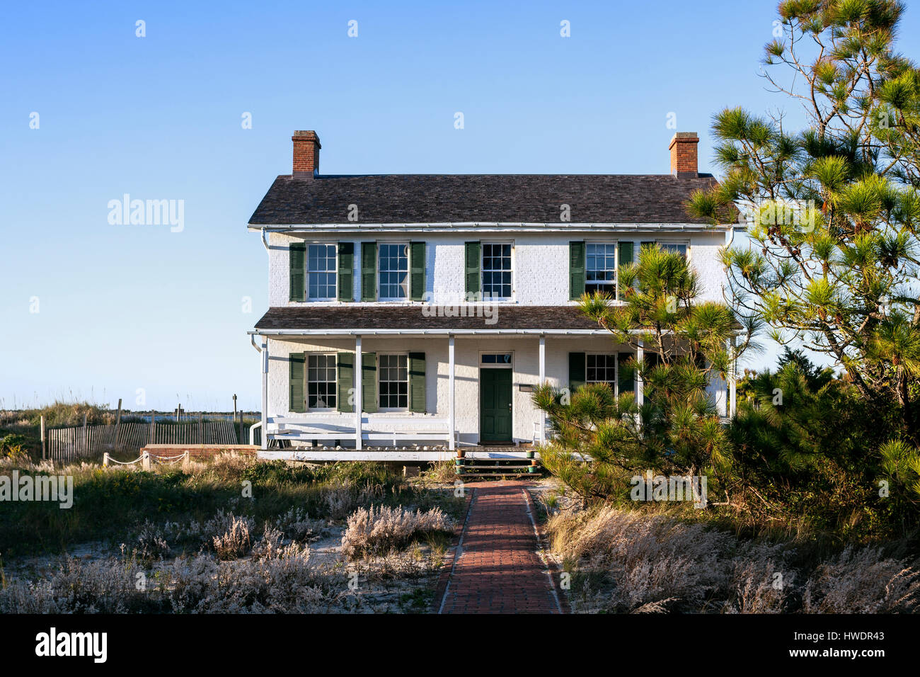 NC00866-00...North Carolina - Fanalisti casa a Cape Lookout National Seashore sul nucleo del sud le banche. Foto Stock