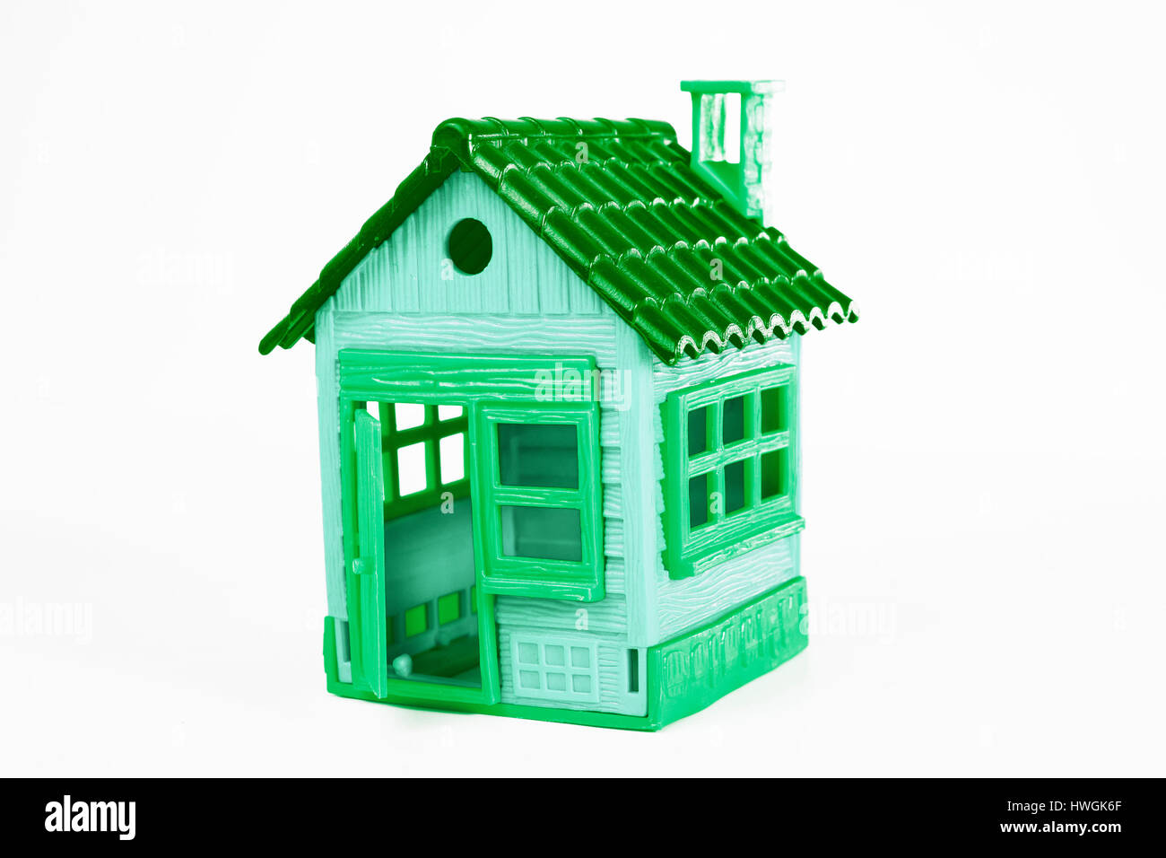 Green House simbolo. Piccola casa giocattolo per ogni concetto. Foto Stock