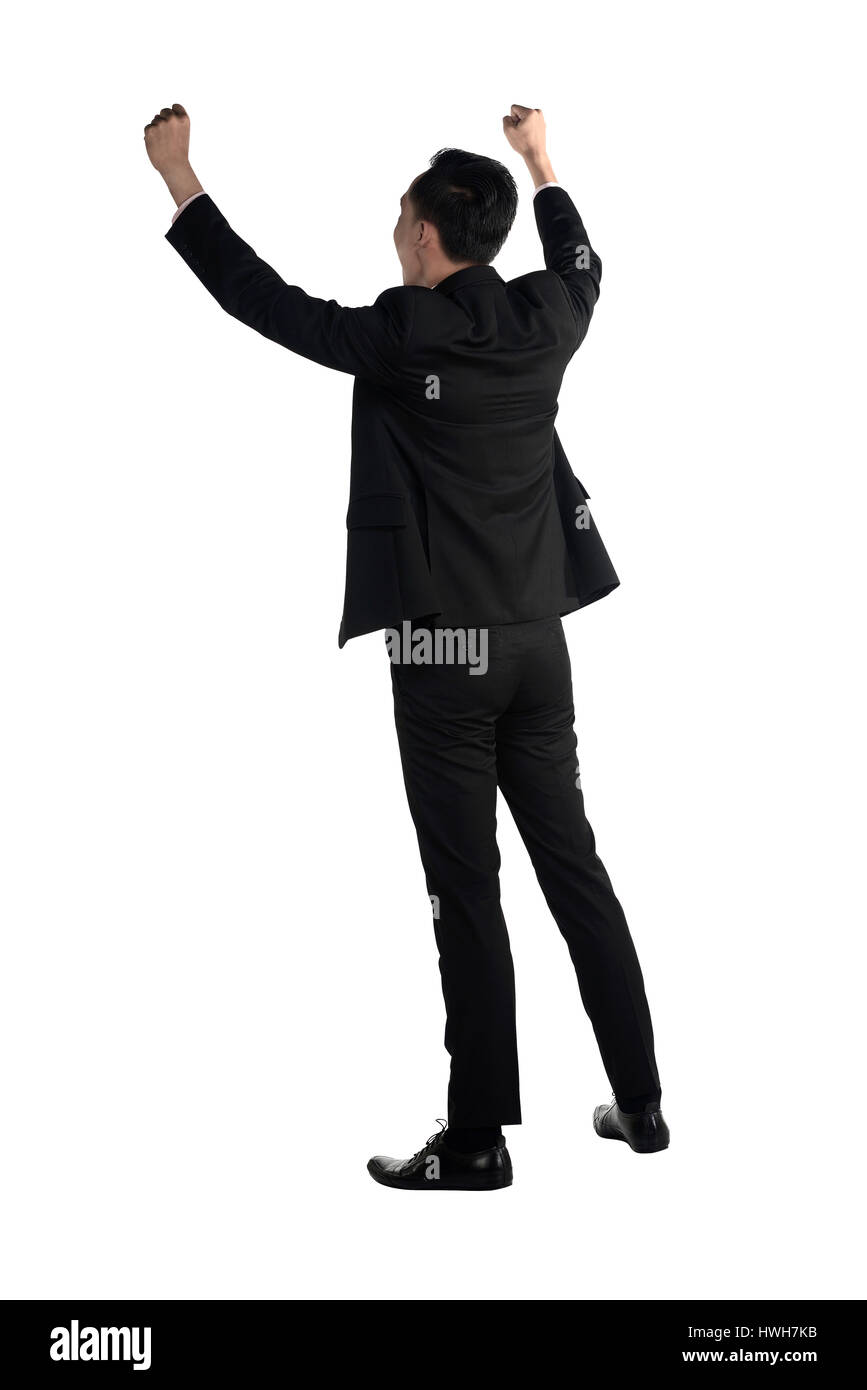 Backview di asian business man mano sollevare isolate su sfondo bianco Foto Stock