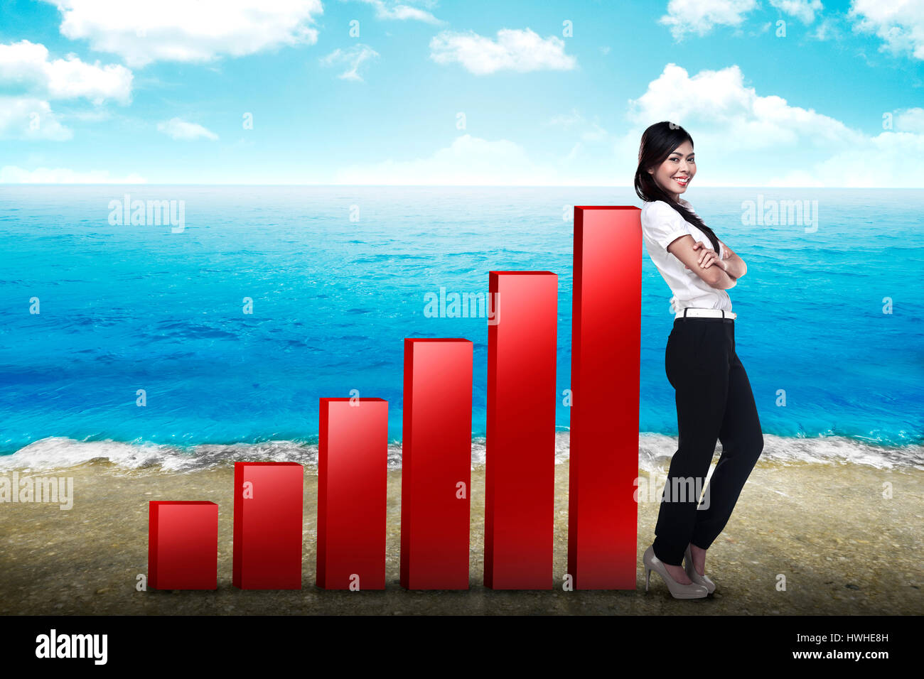 Asian business donna magra crescente sul grafico Foto Stock