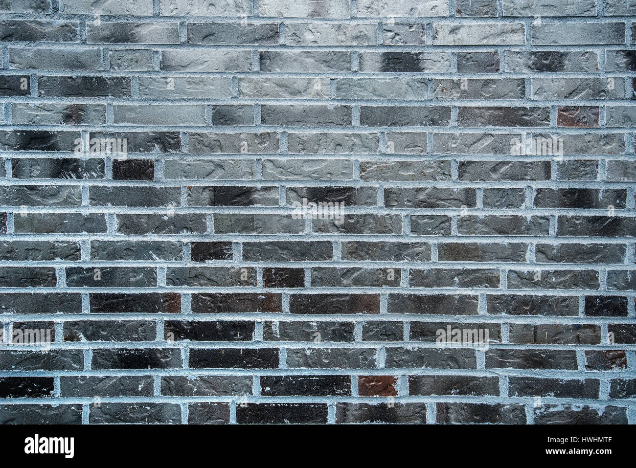 Esterno moderno in mattoni a vista, superficie texture di un muro di mattoni come sfondo Foto Stock