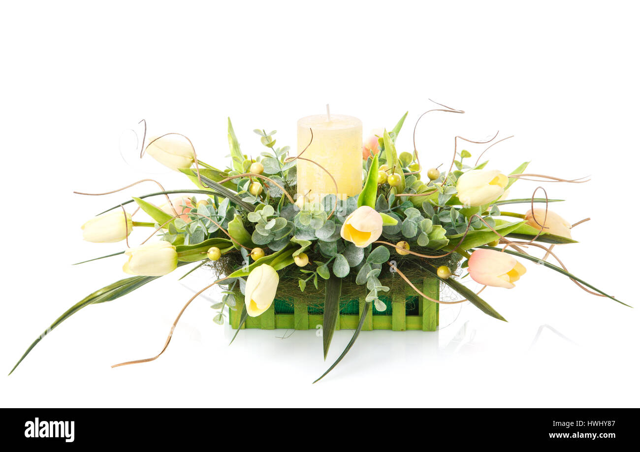 Composizione di fiori e candele per decorare Foto Stock