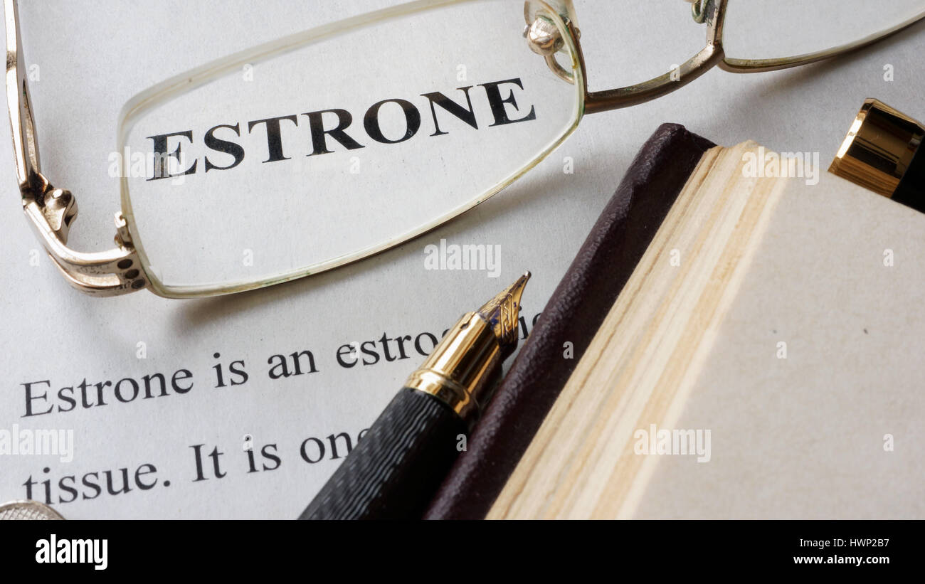 Carta con parola estrone e un libro. Foto Stock