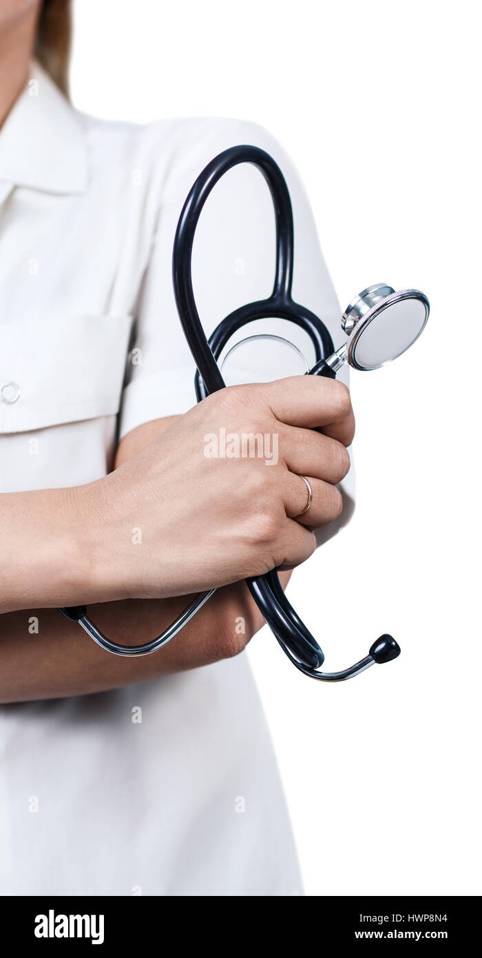 Close-up ritratto di medico donna holding stetoscopio. Isolato su bianco. Foto Stock