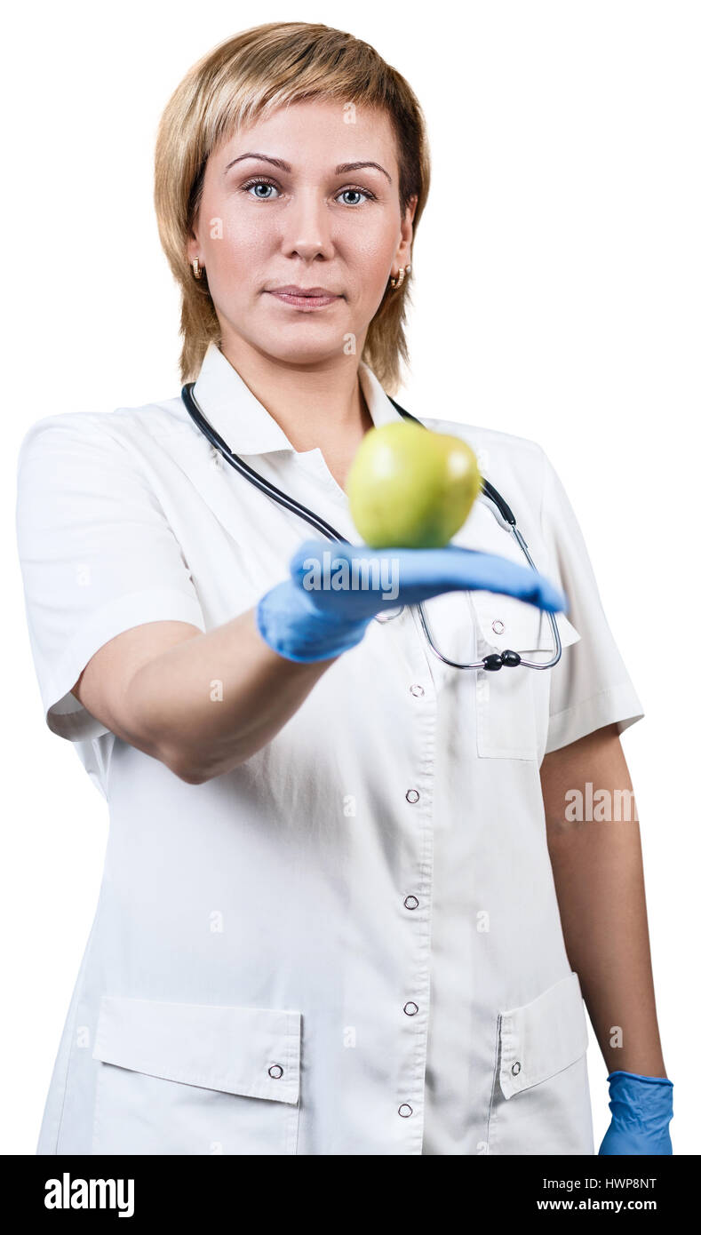 Donna sorridente medico con una mela verde. Concetto di dieta. Foto Stock