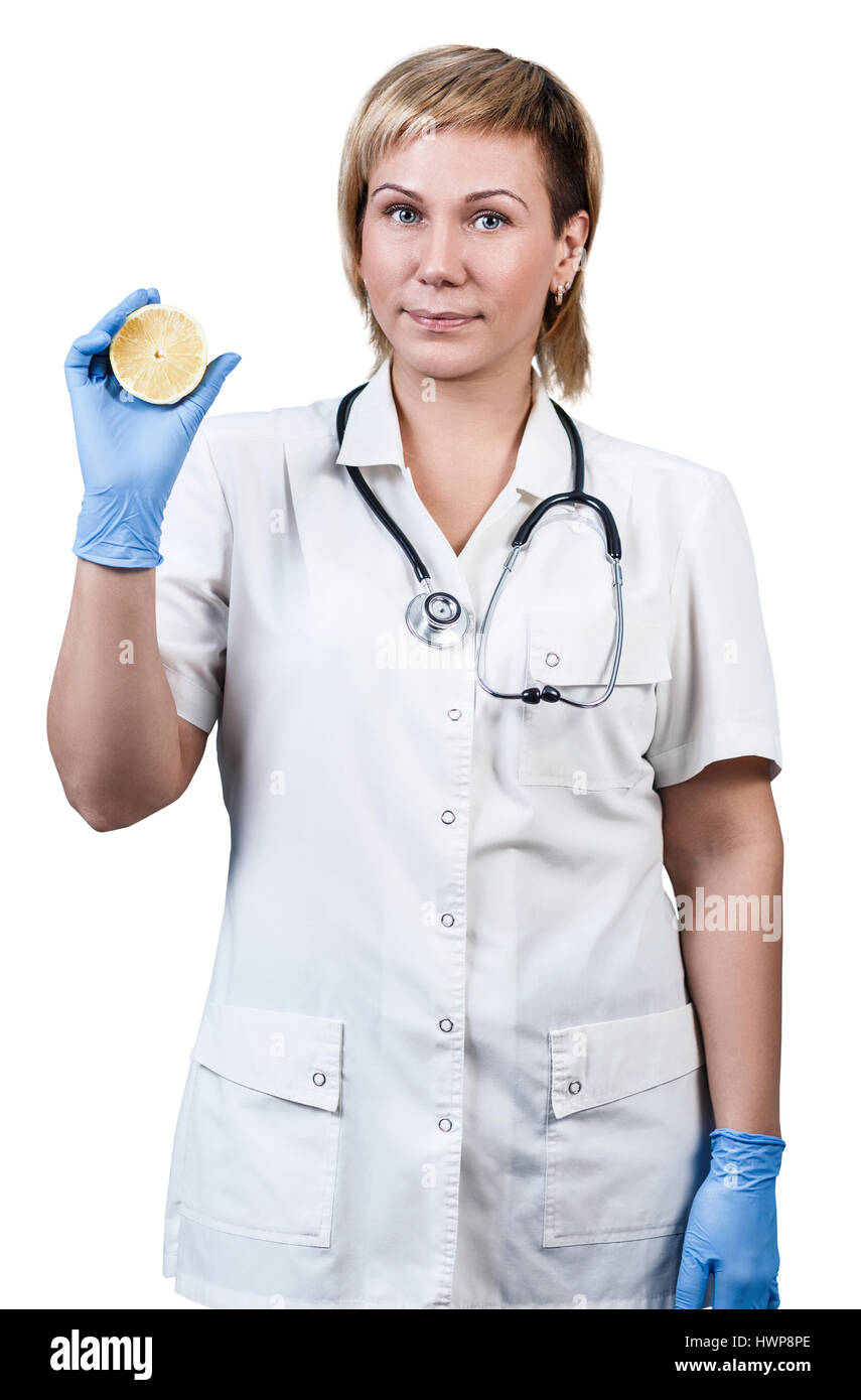 Donna sorridente medico con limone in mano. La sanità e la medicina concept Foto Stock