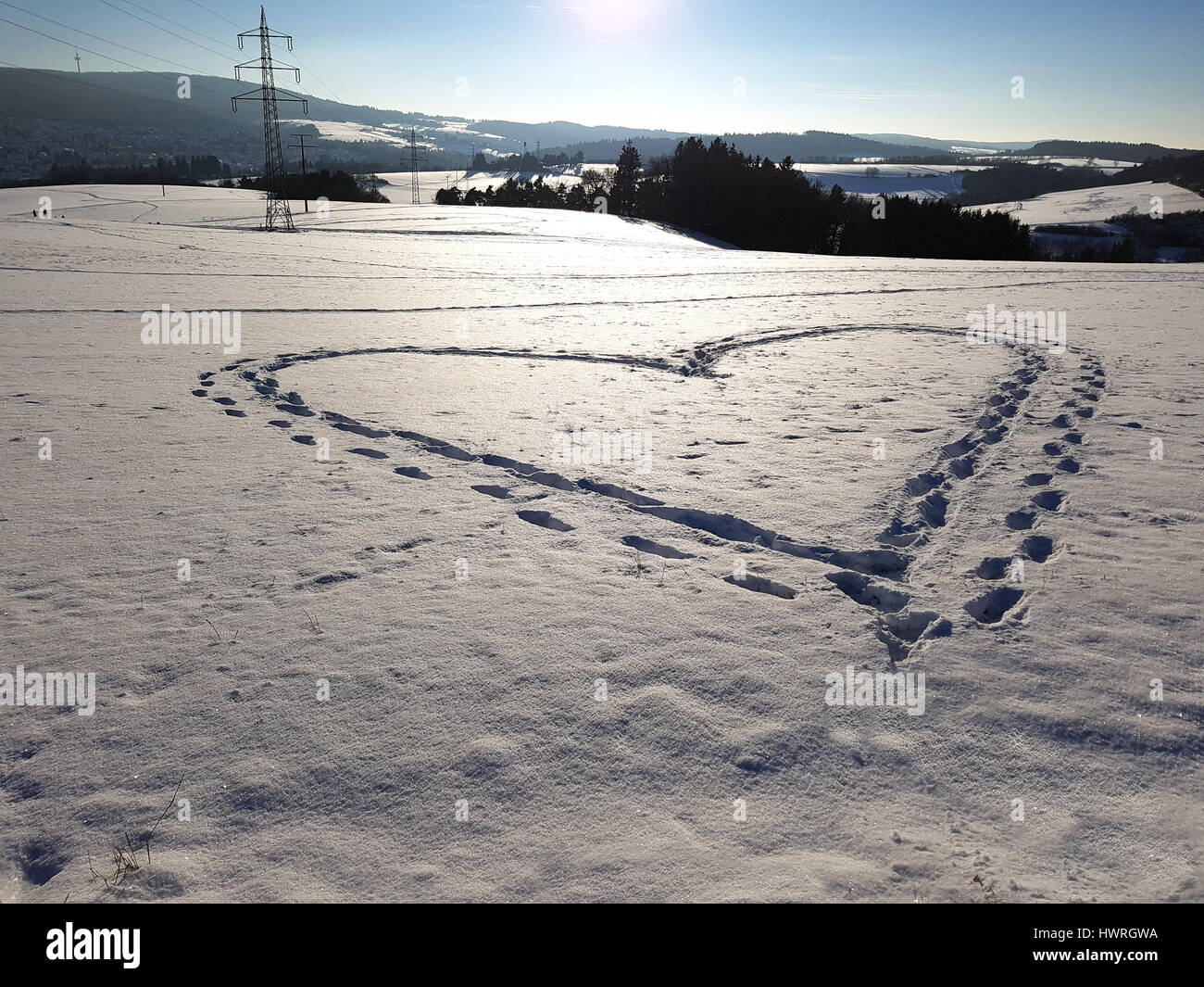 Herzspuren, Spuren, Schnee Foto Stock