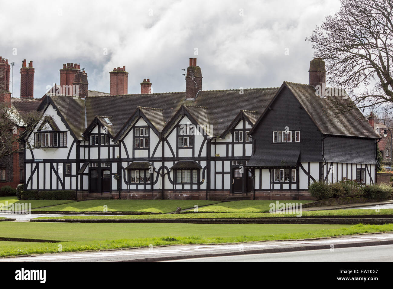 Port Sunlight - un modello di villaggio e borgo nel Metropolitan Borough of Wirral, Merseyside. In bianco e nero in stile tudor case Foto Stock